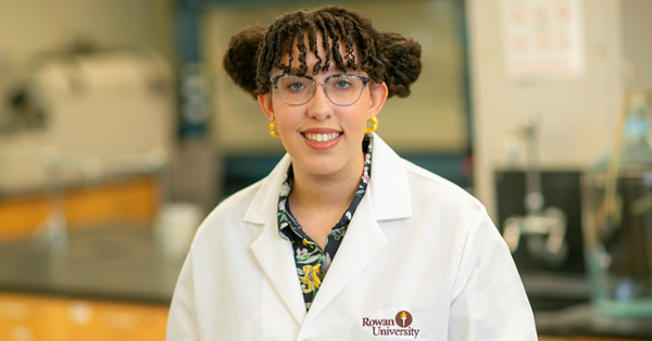 female student in lab coat