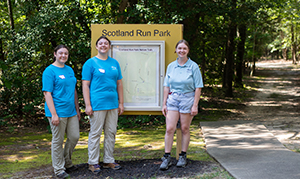 students in front of Scotland Regional Park sign
