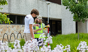 student outside using equipment