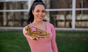 student showing closeup of skull