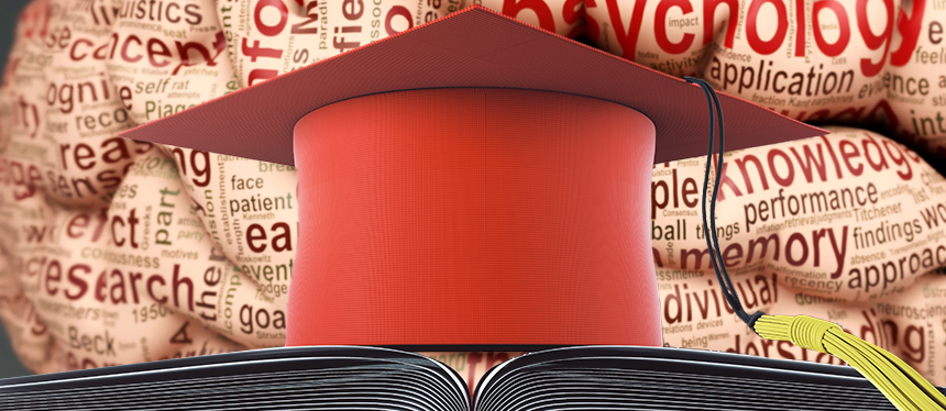 graduation cap in front of psychology terms