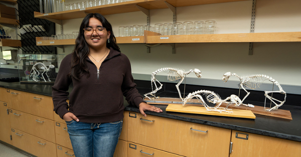Kayla Bhagaloo in a biology laboratory
