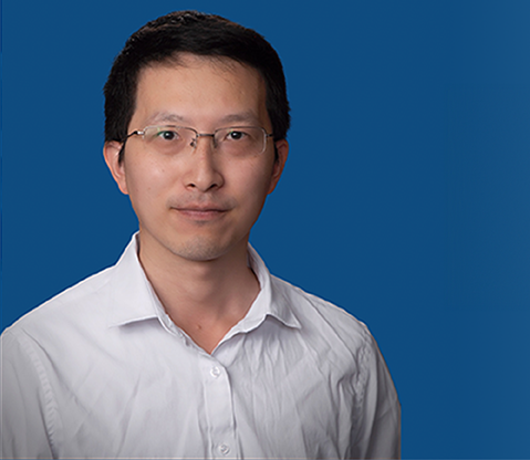 A headshot of Dr. Sihan Yu is placed to the left of a graphic. The graphic has a navy blue gradient background, with the gradient fading into a lighter blue as it moves further right. To the right of Dr. Yu's image is a yellow textbox, with a navy blue inner border. The textbox reads: "Faculty Spotlight Dr. Sihan Yu".