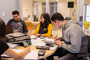 group of students studying together at Rowan Tutoring office